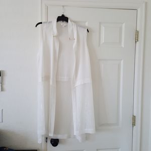 Long sleeveless vest in ivory color sheer w slight gold accent
